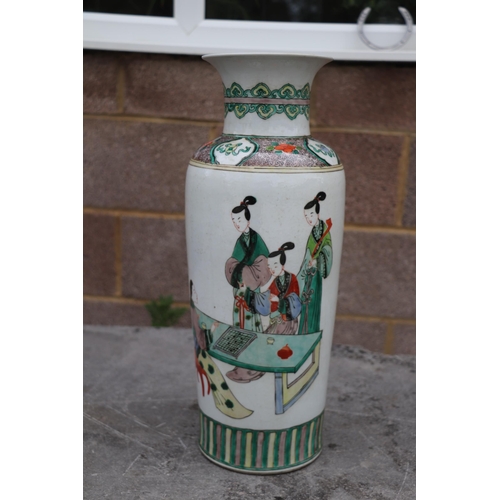 538 - A large pair of Chinese famille vert vases decorated with figures, six character blue mark to the un... 