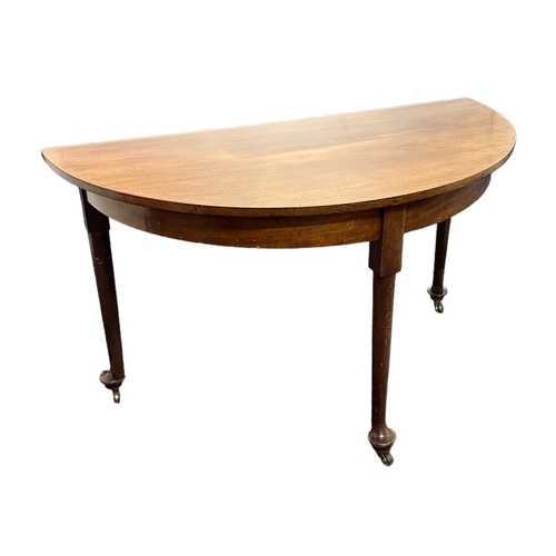 580 - A George III mahogany D-end table with plain frieze and tapering legs terminating in pad feet, (conv... 