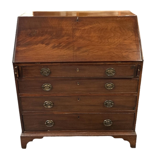 582 - A 19th century mahogany bureau, the fall-front opening to reveal a fitted interior, with maple front... 