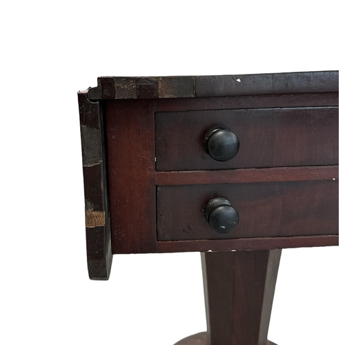 632 - A William IV drop-leaf work table with two short drawers and two dummy drawers, on tapering octagona... 