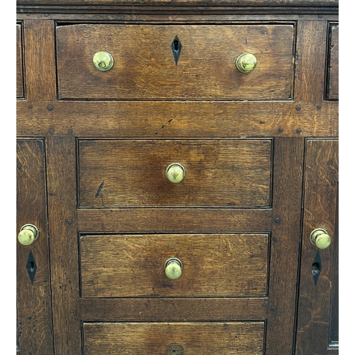 637 - An 18th / 19th century oak country house dresser, the dresser rack with three shelves above an arran... 