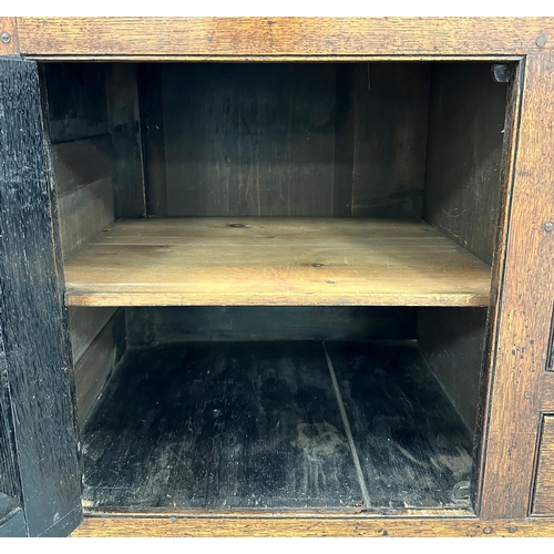 637 - An 18th / 19th century oak country house dresser, the dresser rack with three shelves above an arran... 