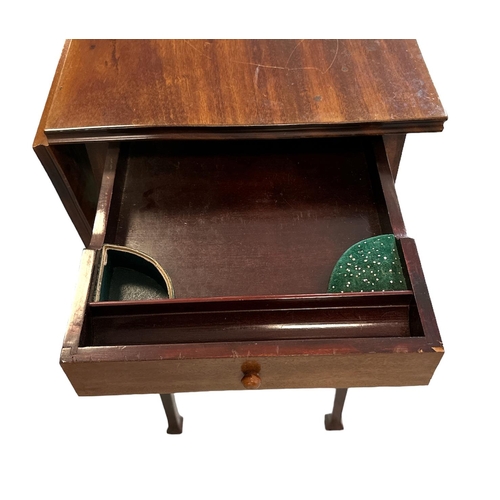 668 - A late 19th / early 20th century walnut work table, 36cms wide.