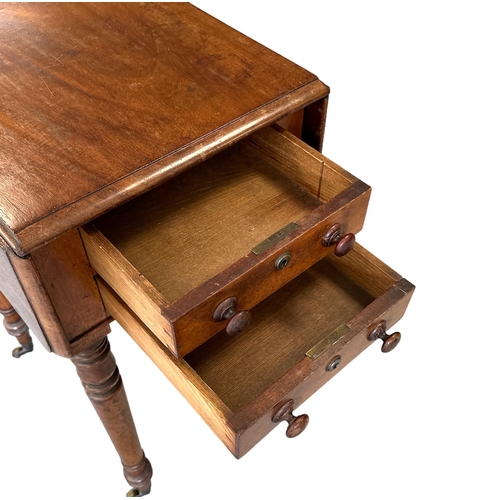 676 - A Victorian drop-leaf work table with two short drawers opposed by two faux drawers, on turned legs ... 