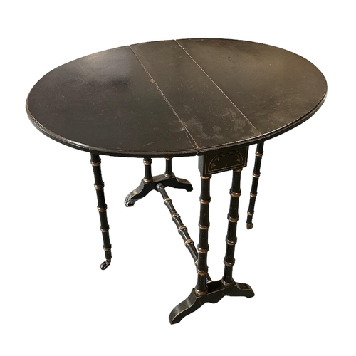 683 - A late 19th century Aesthetic period ebonised Sutherland table, 60cms wide.