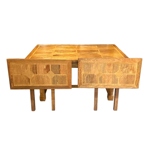 722 - A modern fruitwood extending dining table on turned legs joined by an 'H' stretcher; together with s... 