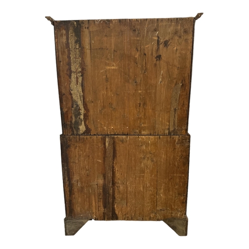 726 - A 19th century oak chest on chest with mahogany crossbanding, the upper section with moulded cornice... 