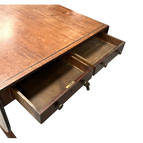 728 - A 19th century mahogany sofa table with ebony and boxwood stringing with two frieze drawers and two ... 