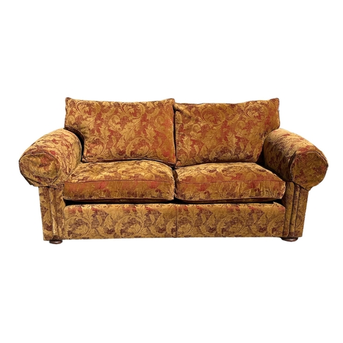 739 - A large modern Duresta scroll arm upholstered sofa, approx 200cms wide.