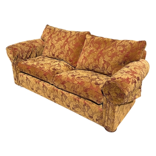 739 - A large modern Duresta scroll arm upholstered sofa, approx 200cms wide.