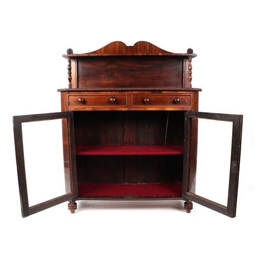 661 - A William IV rosewood chiffonier, the superstructure above two frieze drawers with glazed doors bene... 