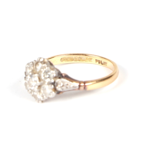 485 - An 18ct gold and platinum diamond cluster ring, approx UK size J, 3g.