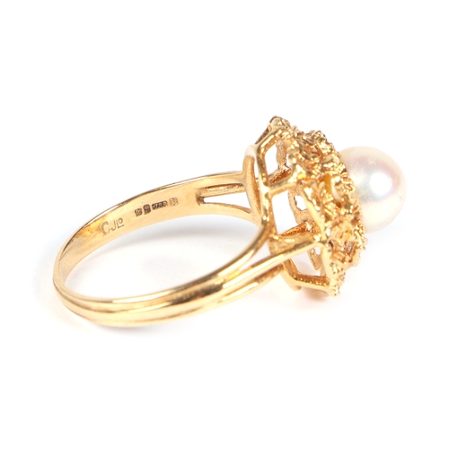 486 - An 18ct gold ring set with a central pearl, approx UK size M, 4g.