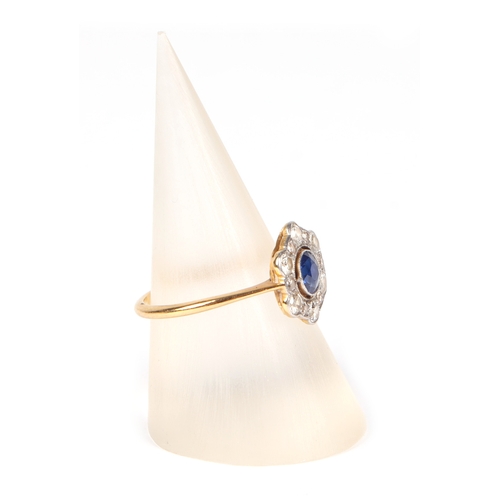 490 - An 18ct gold and platinum diamond and sapphire cluster ring, approx UK size L, 1.9g.