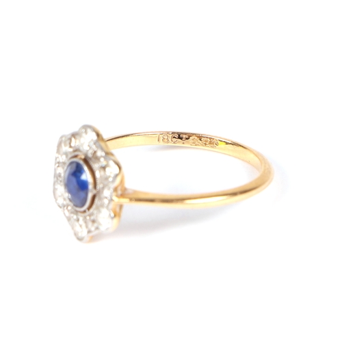 490 - An 18ct gold and platinum diamond and sapphire cluster ring, approx UK size L, 1.9g.