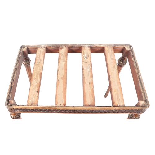 601 - A giltwood luggage rack / table base, 78cms wide.