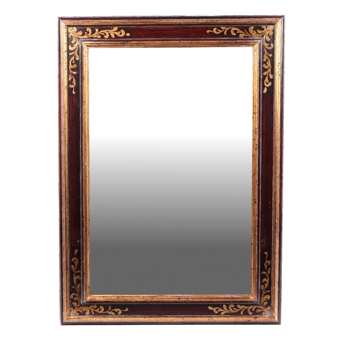 603 - A pair of decorative Regency style gilt framed wall mirrors, overall 68 by 94cms (2).