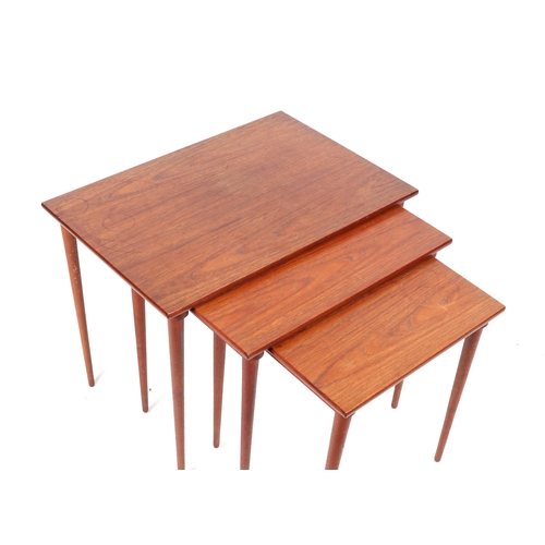 748 - Mid century modern:  a nest of three teak side tables with rectangular tops on slender tapering legs... 