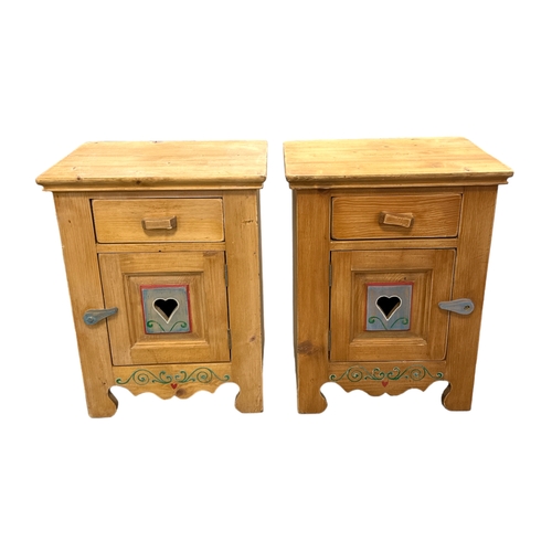 571 - A pair of Scandinavian pine bedside cupboards with painted decoration and single frieze drawer with ... 