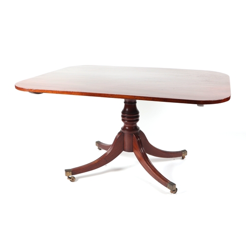 716 - A 19th century mahogany tilt-top breakfast table on turned column and quatrefoil base, 97 by 136cms.