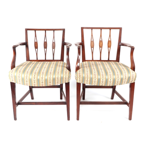 623 - A set of ten George III mahogany dining chairs with shell inlay to the back splats and upholstered s... 