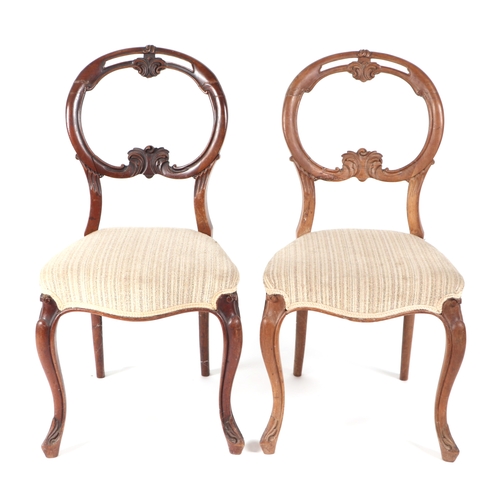 757 - A harlequin set of four 19th century walnut balloon back dining chairs with upholstered overstuffed ... 