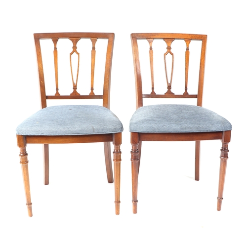 751 - A set of eight reproduction mahogany dining chairs with upholstered seats.