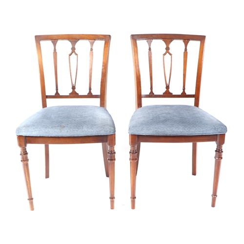 751 - A set of eight reproduction mahogany dining chairs with upholstered seats.