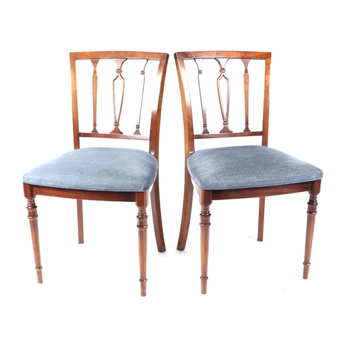 751 - A set of eight reproduction mahogany dining chairs with upholstered seats.