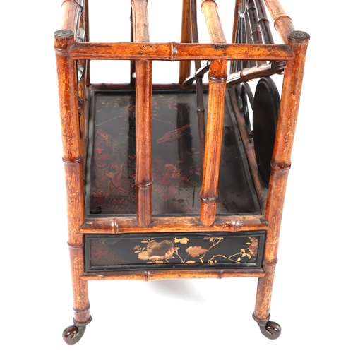 756 - An Aesthetic period bamboo and black lacquer three-division Canterbury with single frieze drawer, th... 