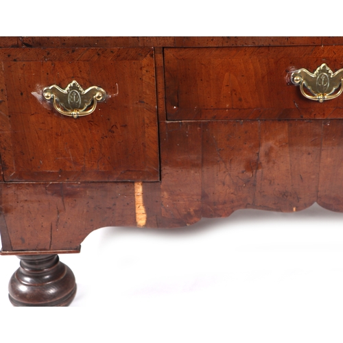 744 - A 19th century walnut chest-on-stand, the chest with an arrangement of six drawers, on stand with th... 