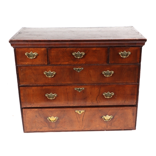 744 - A 19th century walnut chest-on-stand, the chest with an arrangement of six drawers, on stand with th... 