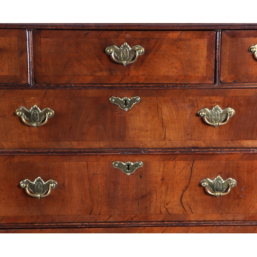 744 - A 19th century walnut chest-on-stand, the chest with an arrangement of six drawers, on stand with th... 