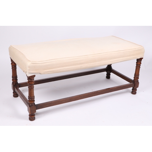 749 - A George III style upholstered window seat on baluster turned supports joined by stretchers, 105cms ... 