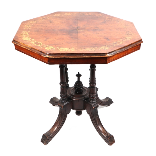 738 - A late Victorian walnut occasional table, the octagonal top inlaid with garlands of leaves, quatrefo... 