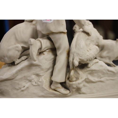 244 - A Copeland Parian figural group depicting terriers at a rabbit hole, 28cms high; together with a pai... 