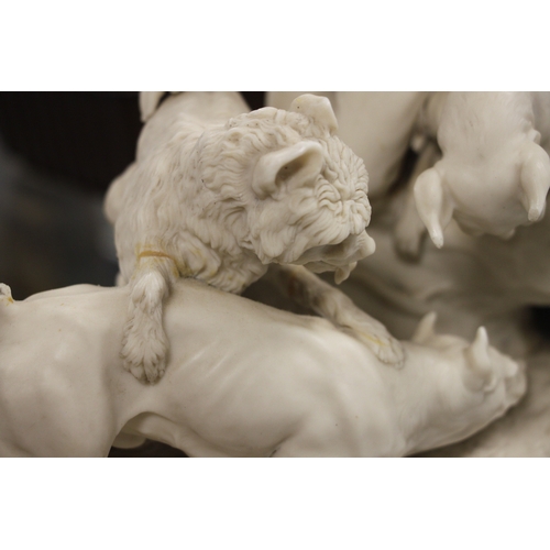 244 - A Copeland Parian figural group depicting terriers at a rabbit hole, 28cms high; together with a pai... 