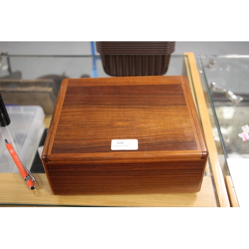 320 - An Elie Bleu French walnut humidor, 24cms wide.