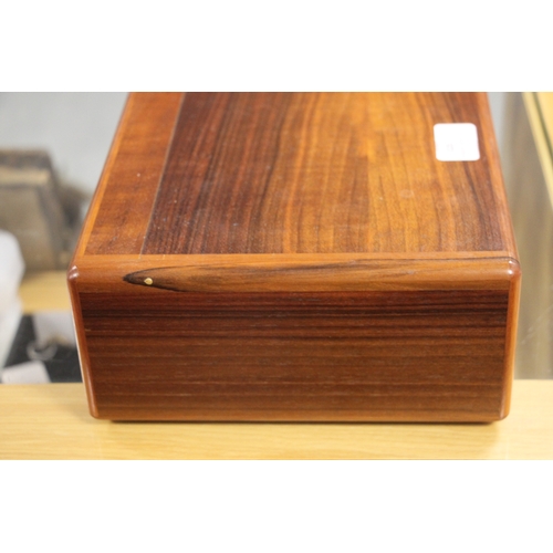 320 - An Elie Bleu French walnut humidor, 24cms wide.