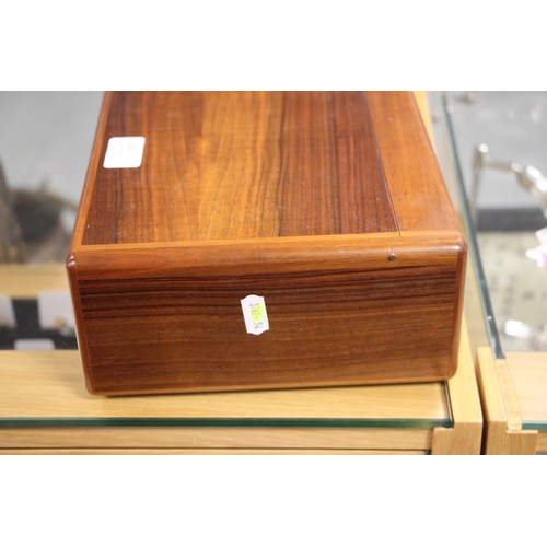 320 - An Elie Bleu French walnut humidor, 24cms wide.