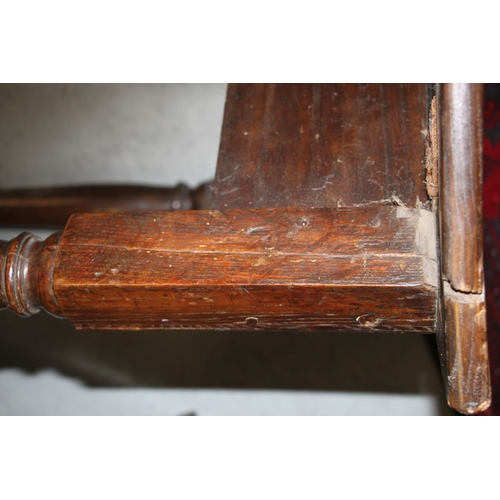 718 - A George II oak triangular drop-leaf occasional table of joint pegged construction with tapering leg... 