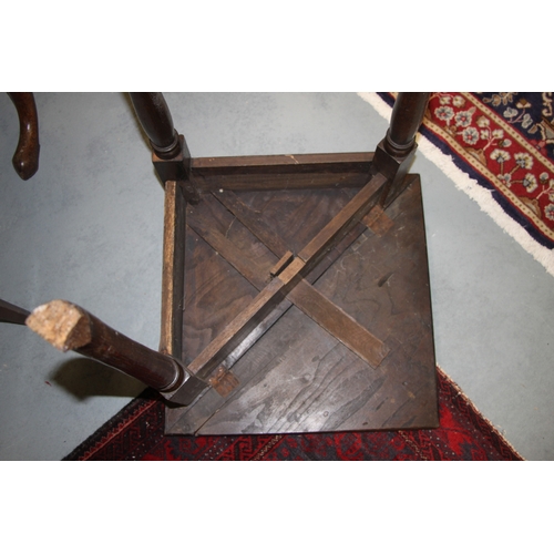 718 - A George II oak triangular drop-leaf occasional table of joint pegged construction with tapering leg... 