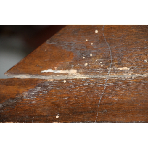 718 - A George II oak triangular drop-leaf occasional table of joint pegged construction with tapering leg... 