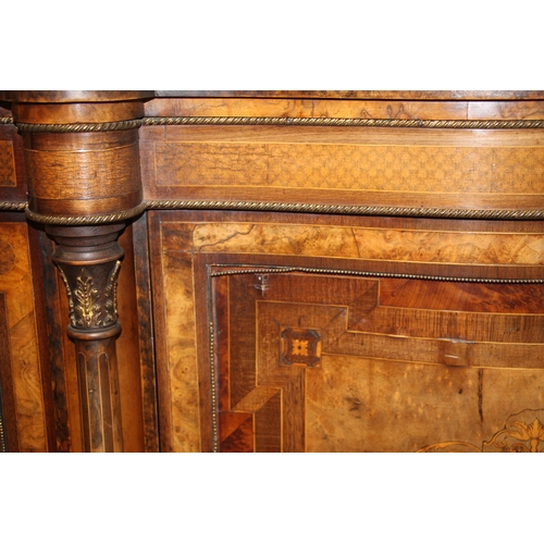 733 - A Victorian walnut and rosewood crossbanded breakfront Credenza with brass inlaid decoration, the ce... 