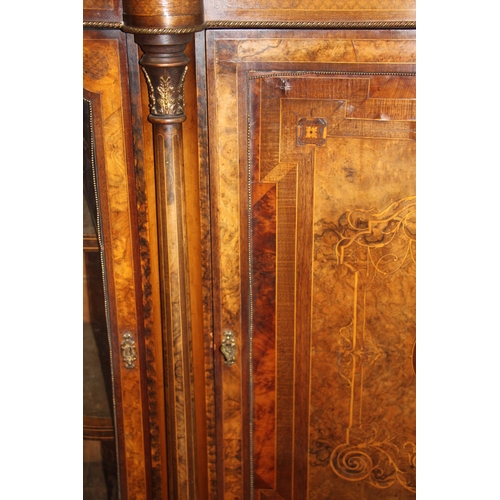 733 - A Victorian walnut and rosewood crossbanded breakfront Credenza with brass inlaid decoration, the ce... 