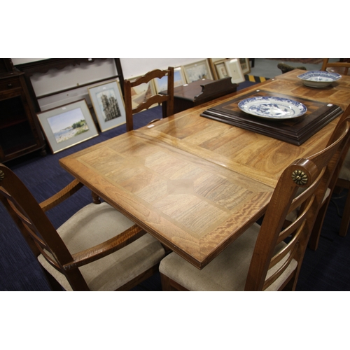 722 - A modern fruitwood extending dining table on turned legs joined by an 'H' stretcher; together with s... 