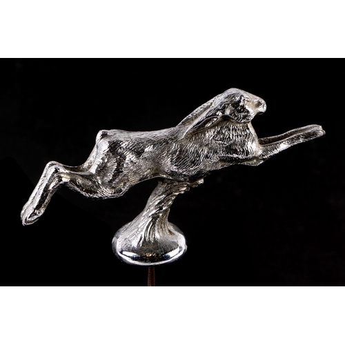 11 - An accessory car mascot in the form of a leaping hare, 14cms long.