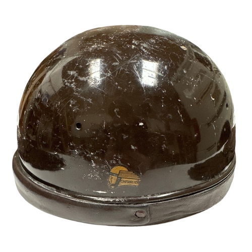 34 - A 1930's French Chevelier crash helmet with brown leather neck guard and strap; together with a pair... 