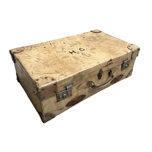 52 - A large vintage vellum suitcase, the lid initialled 'H.C.', 77cms wide, 45cms depth and 26cms high.