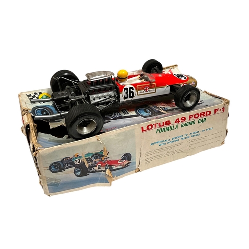 59 - A 1970's Junior Products (Japan) tinplate battery operated Lotus 49 Ford F-1 Formula Racing Car cons... 